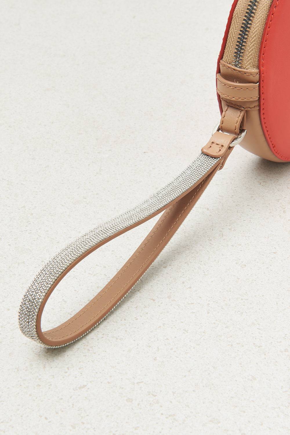 Peserico Borsa rotonda in vera pelle con polsiera e tracolla Moda