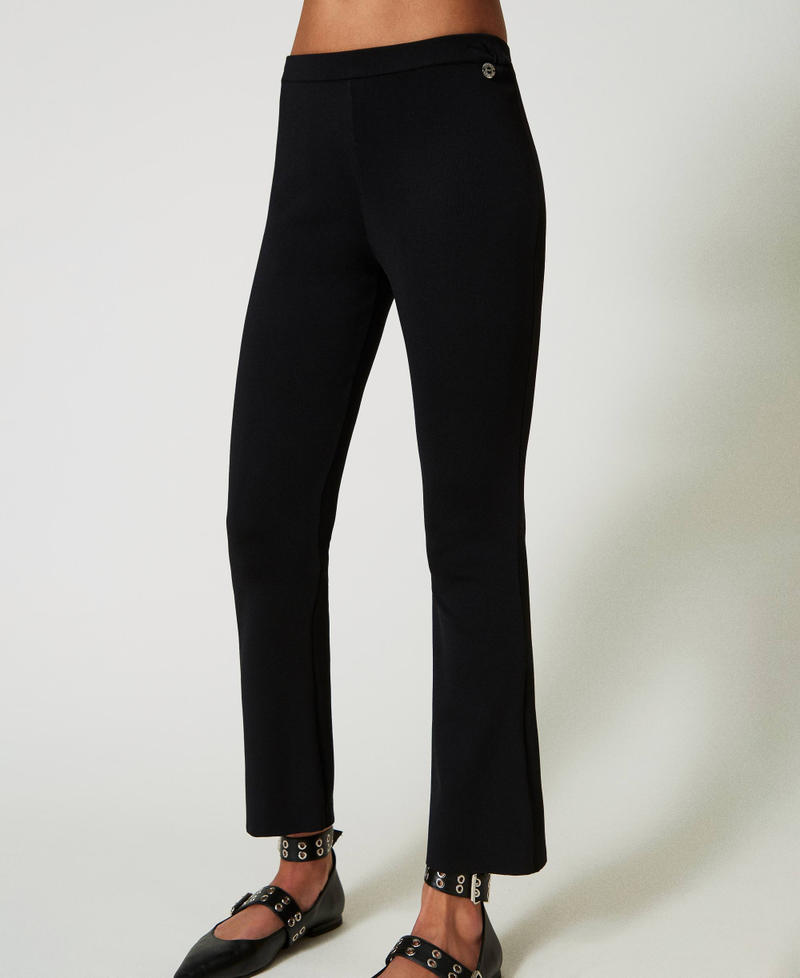 Scee by twin set Pantaloni flare in maglia Grandi sconti