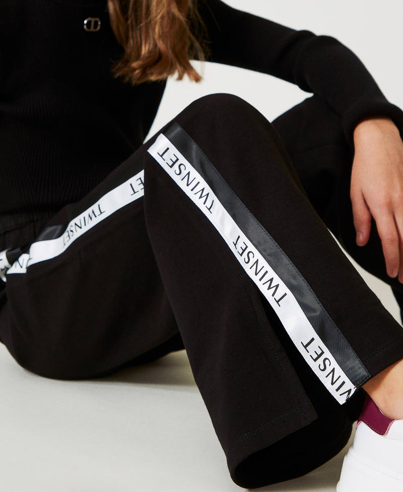 Scee by twin set Pantaloni a palazzo in felpa con logo Liquidazione