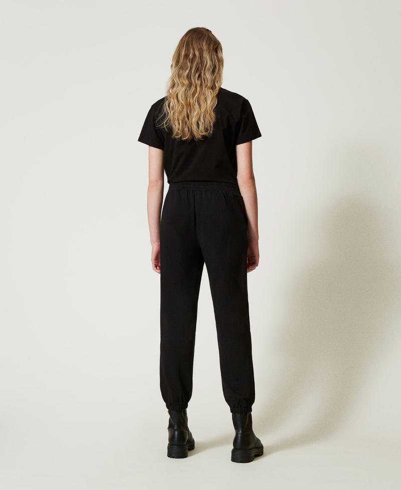 Scee by twin set Pantaloni joggers in felpa con raso Fornitura limitata