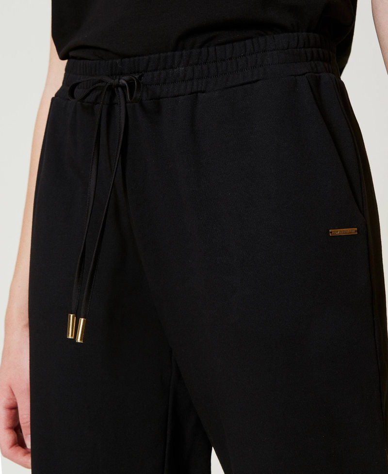 Scee by twin set Pantaloni joggers in felpa con raso Fornitura limitata